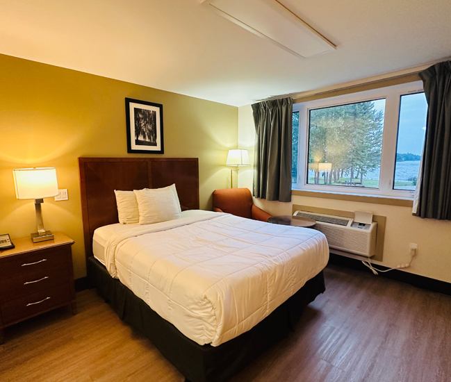 Lake-view queen room looking out on Pelican Lake at Forest Inn in Sioux Lookout