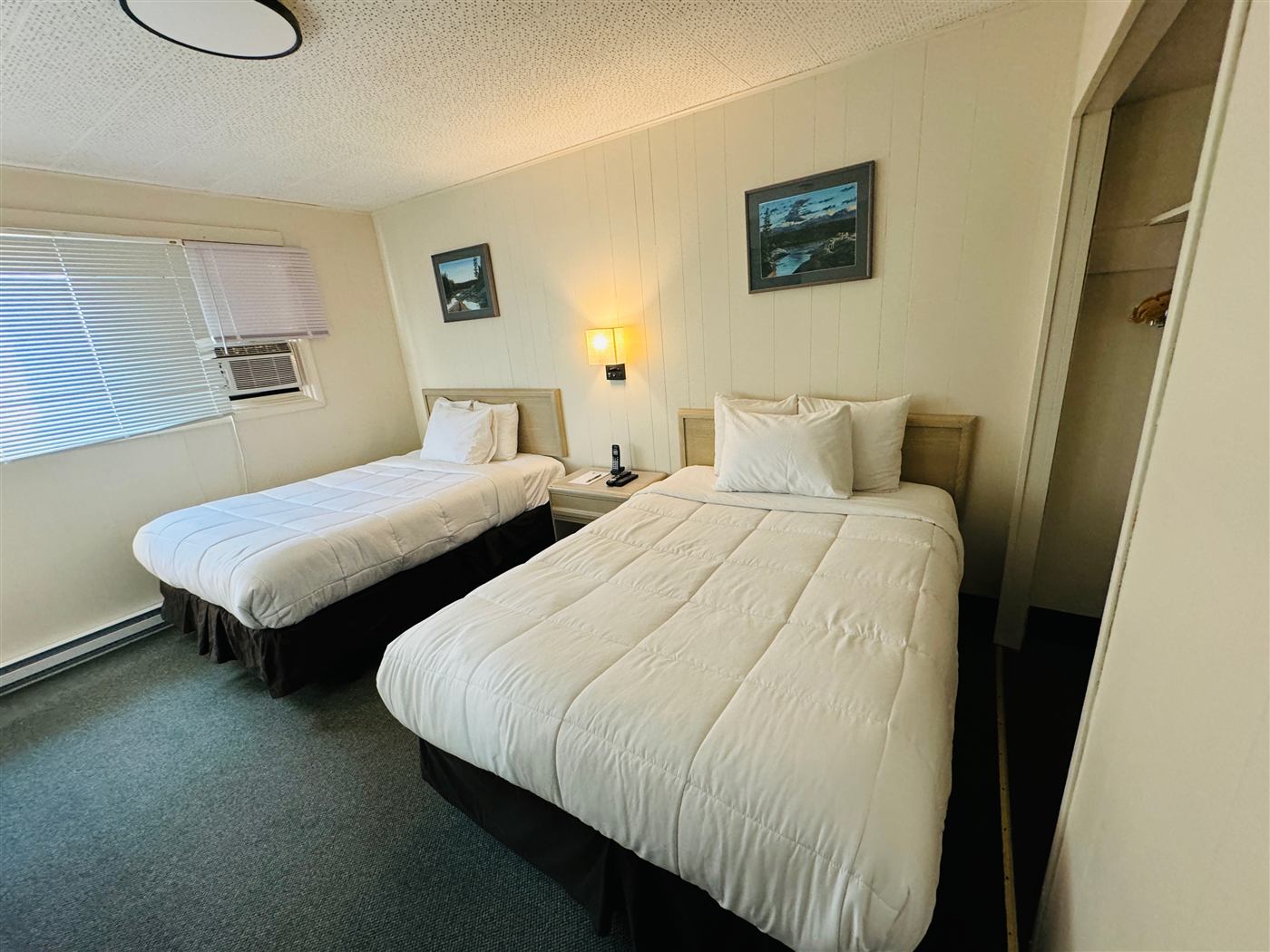 Bedroom in the two-bedroom suite at Forest Inn and Conference Centre, Sioux Lookout